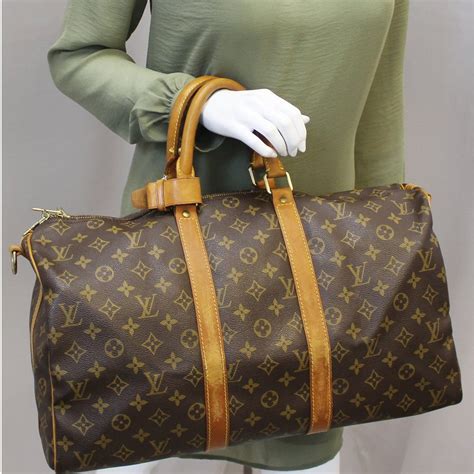 louis vuitton monogram keepall 45 price|keepall 55 with shoulder strap.